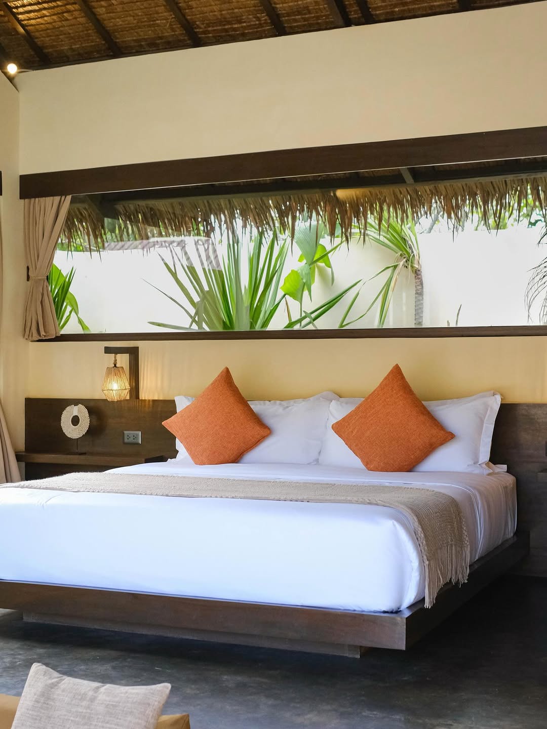 Nala Villas — villa bedroom with tropical light